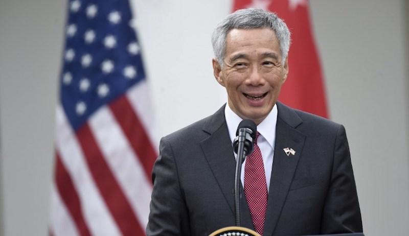 Prime Minister Lee Hsien Loong at a joint press conference last October with US President Donald Trump, whose salary is considerably lower. Photo: Saul Loeb/AFP