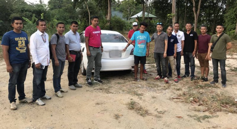 Tawan points at the car he stole. Photo: The Phuket News