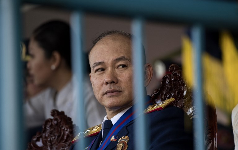 Incoming Philippine National Police (PNP) chief Oscar Albayalde attends the change of command ceremony at Camp Crame in Manila on April 19, 2018. / AFP PHOTO / NOEL CELIS