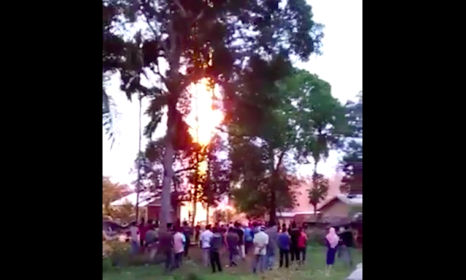 An illegal oil well in Aceh catching fire on April 25, 2018. Photo: Twitter/@Sutopo_PN