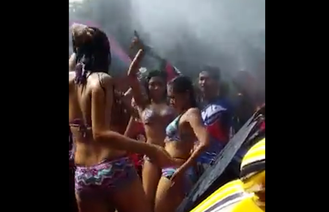 Women in bikinis dancing during a motorcycle community anniversary event in Jepara, Central Java on April 13, 2018. Photo: Youtube