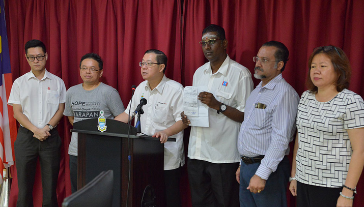 Chew, second from left, clearly wondering how he ended up getting done this 