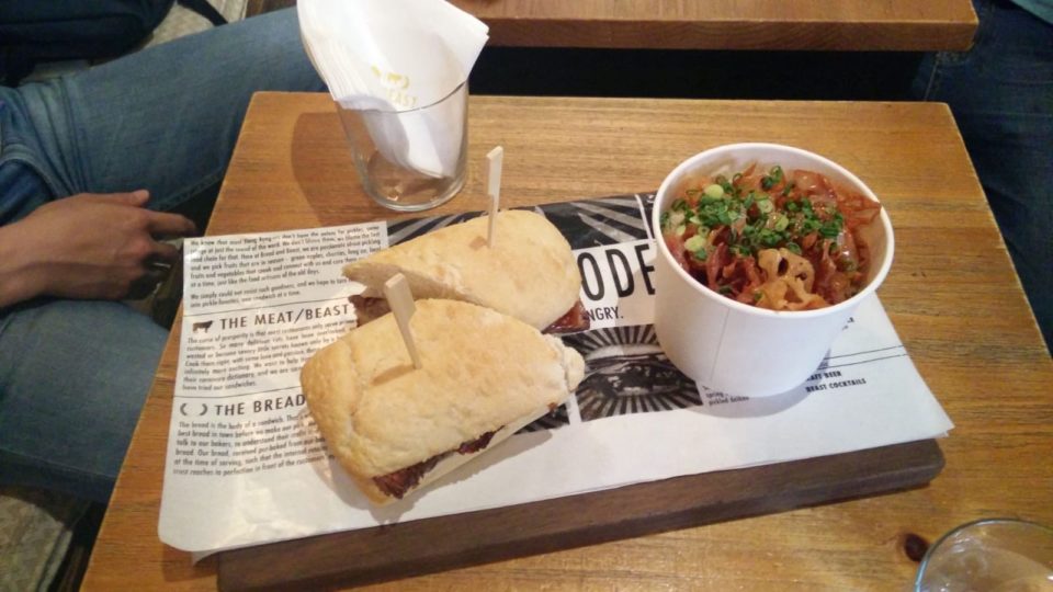 Bread and Beast’s signature dish the Ngau Lam Wich, and lotus root chips. Photo by Vicky Wong.