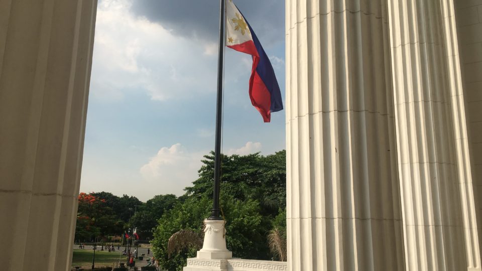 The Philippine flag waves outside the National Museum. (Photo: Therese Reyes)