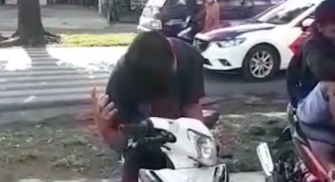 Viral: Motorcyclist pretends to be possessed to avoid ticket, cops don ...