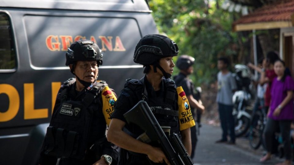 Police in Surabaya following the terrorist attacks on 3 churches in May 2018. PHOTO: Juni Kriswanto / AFP