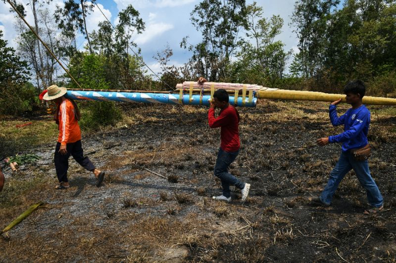 One of the home-made rockets at the festival (AFP Photo/Lillian SUWANRUMPHA)