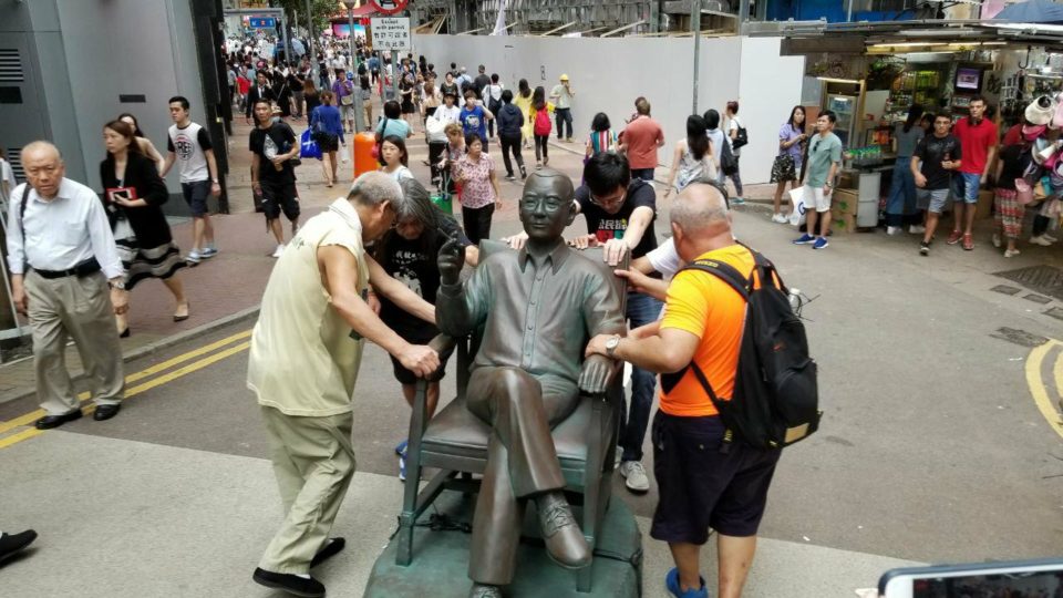 Activists remove the statute of Liu Xiaobo from outside Times Square in Causeway Bay. Picture: Supplied