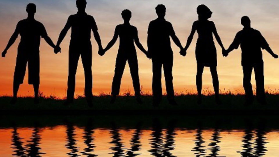 Do the wave for World Oceans Day. Photo via One Island One Voice