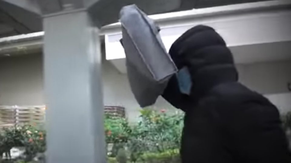 
A picture of the suspect leaving an earlier court hearing. Picture Apple Daily screen grab