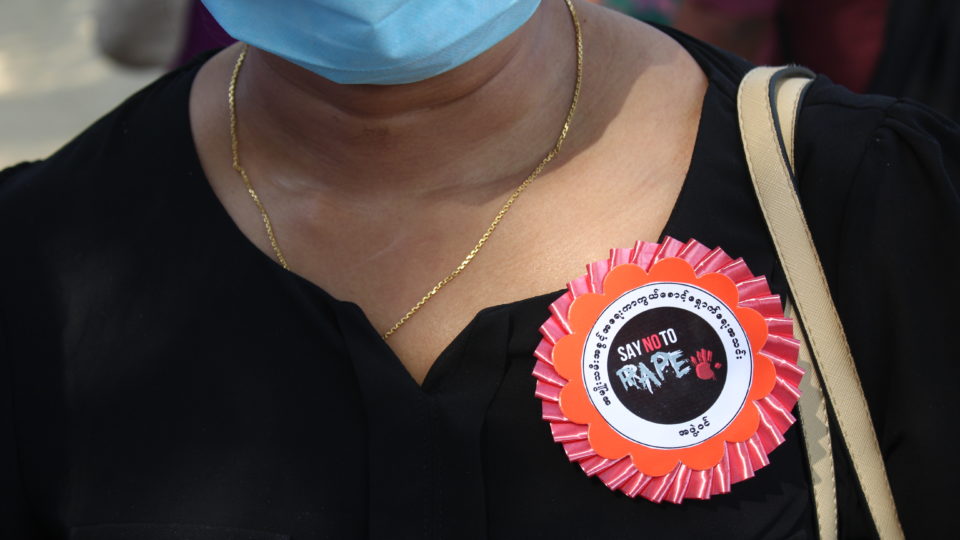 A woman attends a protest demanding the death penalty for rapists in Yangon on Feb. 21, 2018. Photo: Jacob Goldberg