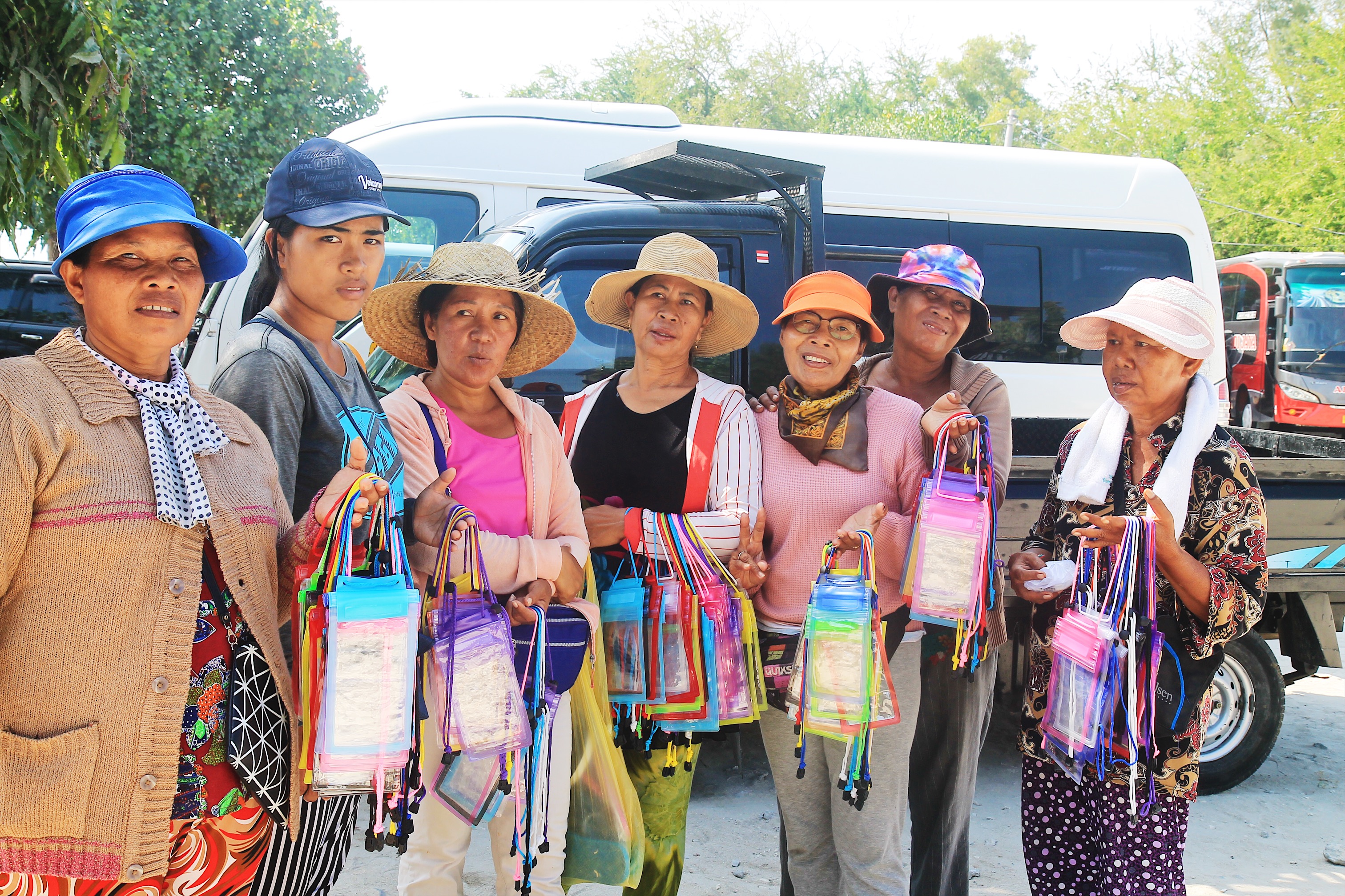 The evolution of Serangan. From selling coconuts and nasi goreng to surfers, to selling plastic phone lanyards to tourists. Photo: Jan Glenn/Coconuts Bali