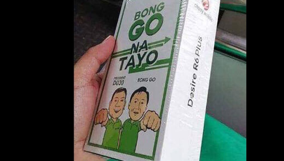 The cellphones with images of Bong Go and President Rodrigo Duterte drawn on the box. Photo via ABS-CBN.