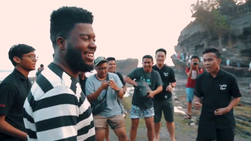 Khalid laying it down with some new friends at Bali’s Tanah Lot temple. Photo: Twitter @thegreatkhalid