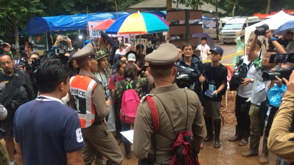 Police told reporters to leave the rescue site. Photo: Thai News Agency/ Twitter