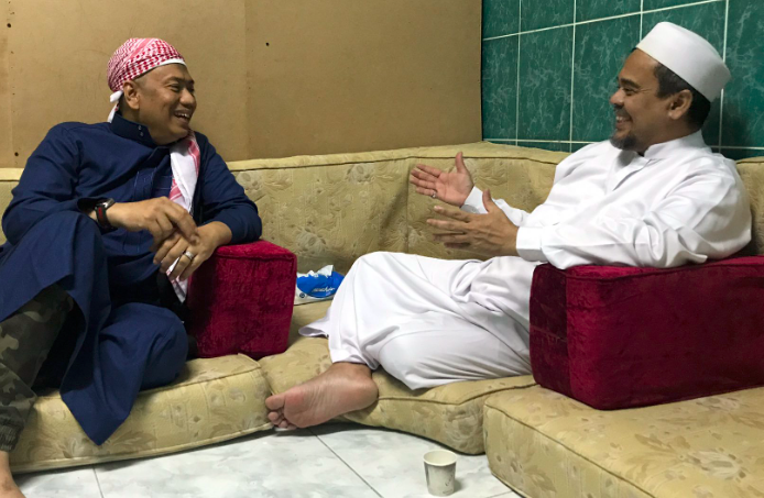 Kapitra Ampera (left) with Islamic Defenders front leader Rizieq Shihab. Photo: Twitter/@kapitraampera