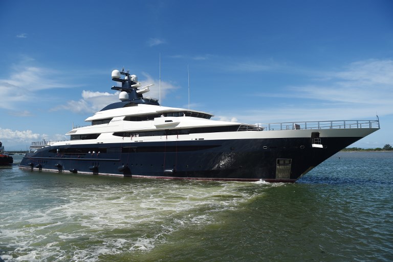 The Cayman Island-registered vessel Equanimity, which is reportedly worth some 250 million USD and is owned by Jho Low, a former unofficial adviser to the Malaysian fund 1MDB, is pictured at Benoa harbour in Bali on April 13, 2018. AFP PHOTO / Sonny Tumbelaka 