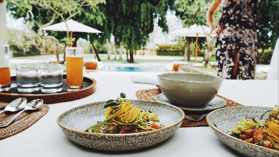 Kombucha and pesto zoodles, poolside. Photo: Coconuts Bali