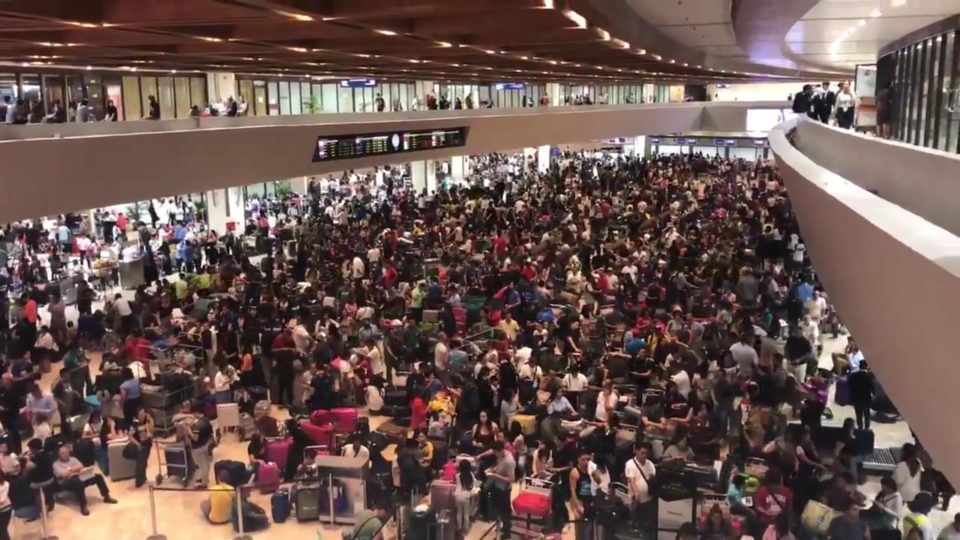 Passengers of cancelled flights are stuck at the Ninoy Aquino International Airport in Manila after a Chinese passenger plane skids off the runway Thursday night. PHOTO: Screengrab from Jacque Manabat / Twitter