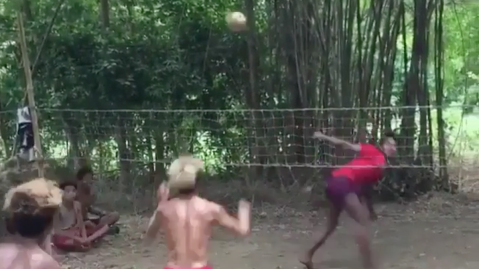 Screenshot from a viral sepak takraw game in a village outside Yangon. Image via Instagram / @kingleduc