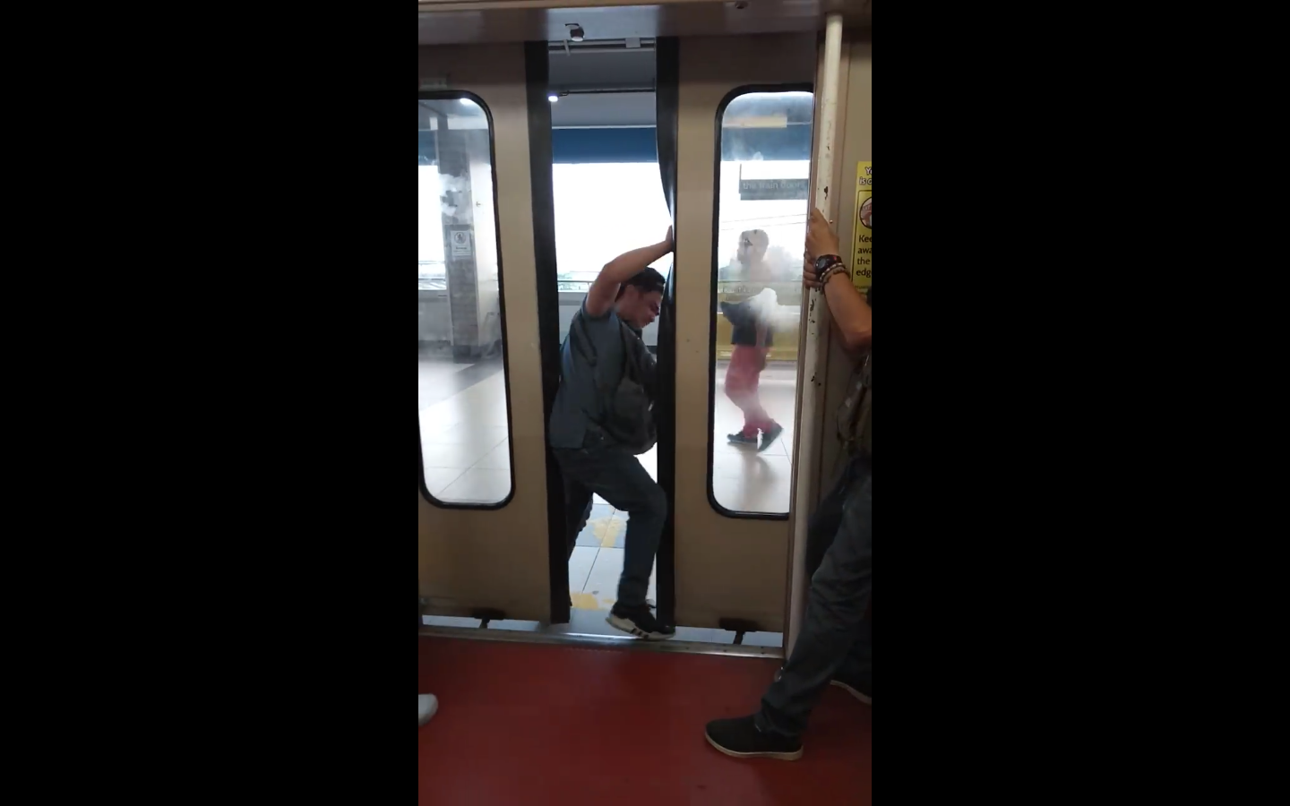 YOU SHALL NOT PASS Malfunctioning train door closes by itself, makes