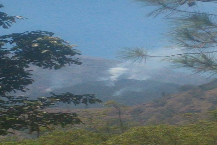 Smoke on the slopes of Mount Agung. Photo via Bali Post