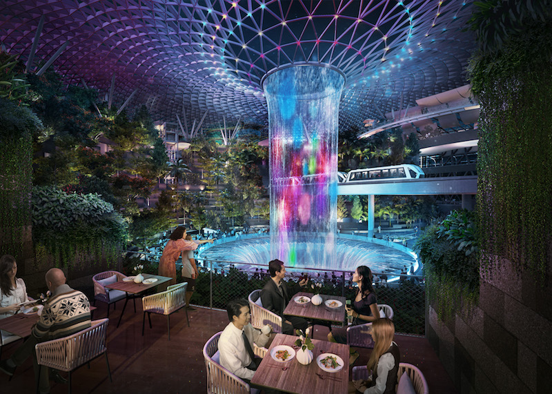 Garden dining, with views of the 40m-tall Rain Vortex. Photo: Jewel Changi Airport Devt.