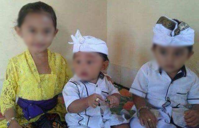 The three children of Balinese woman Ni Luh Putu Septyan Parmadani. Photo via Nusa Bali