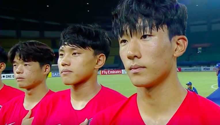 South Korean soccer players while the North Korean national anthem was mistakenly played before a match in Bekasi, Indonesia on Oct. 22, 2018. Photo: Video screengrab from Youtube
