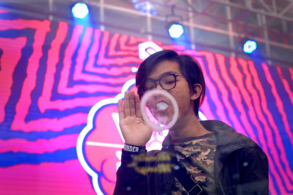 A vape cloud tricker warms up before vape cloud trick competition during the 2018 Jakarta Vape Fest in South Jakarta. Photo: Reynold Sumayku