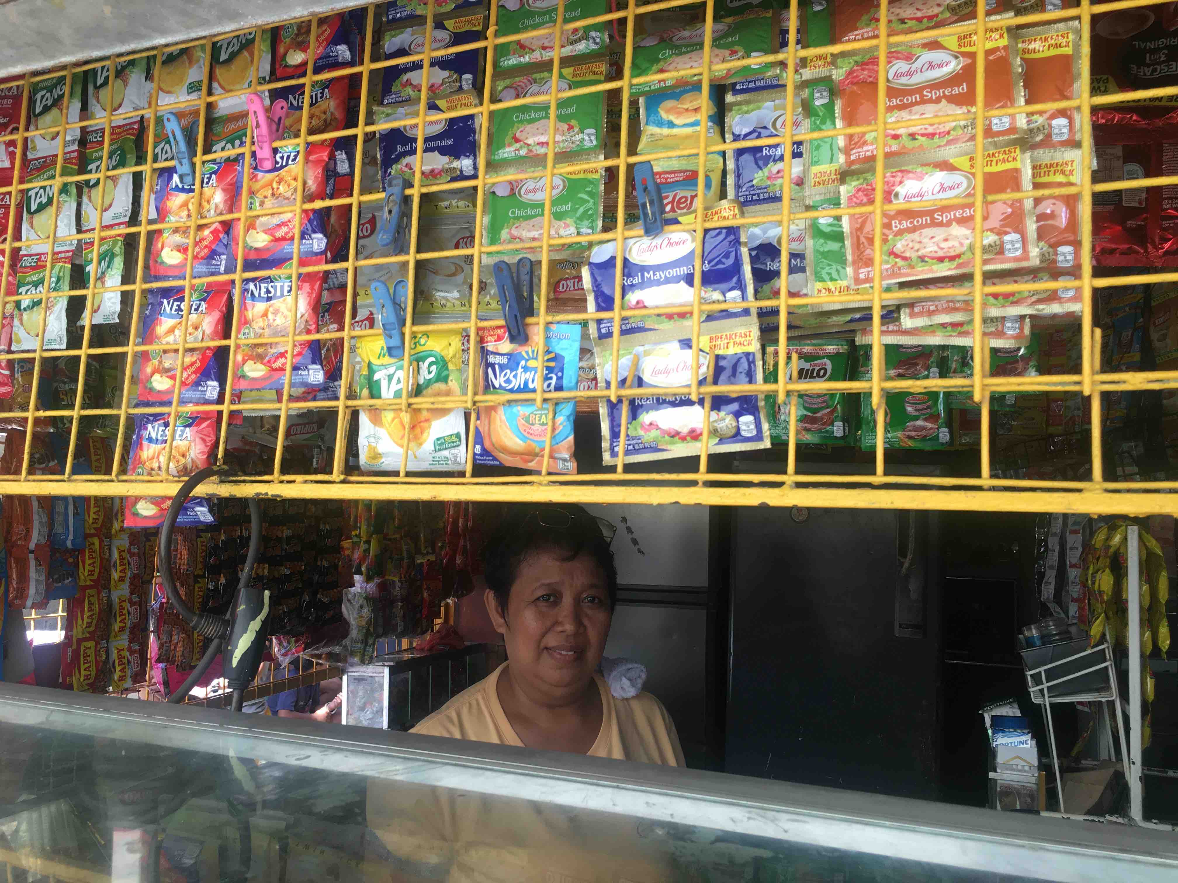 Larona in her sari-sari store. (Photo: Therese Reyes) 