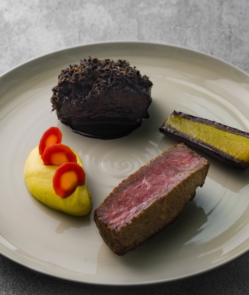 Salt Grill & Sky Bar’s Grilled Sirloin with glazed Westholme Cheek, salt-baked carrot and black truffle tarragon.