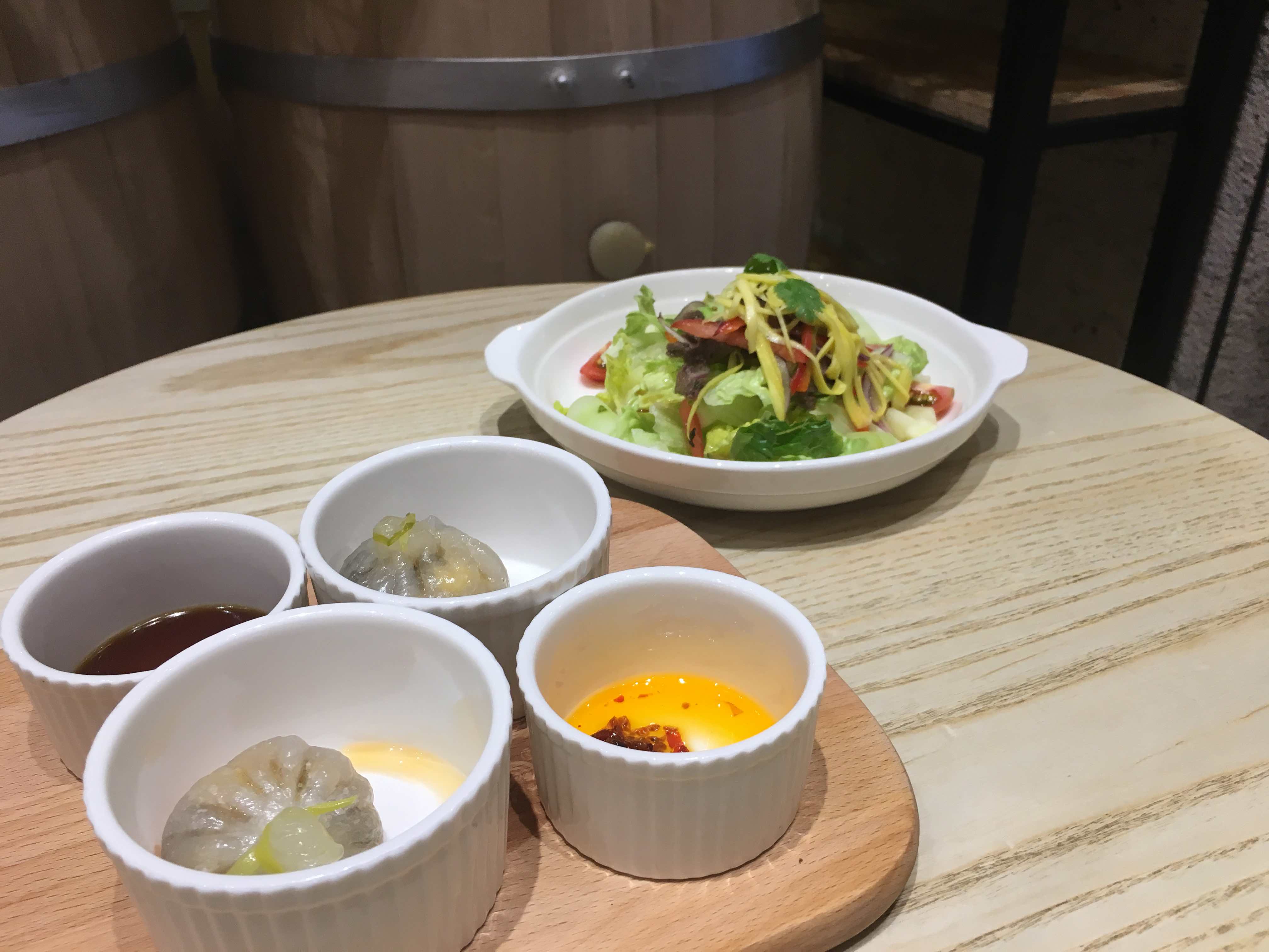 Vegetable Dumpling (front) and Thai Beef Salad (back). (Photo: Angelica Reyes)