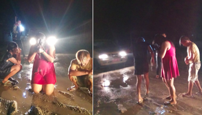 Three transwomen in Indonesia’s Lampung province after authorities hosed them down with a fire truck. Photo: Twitter / @andreasharsono