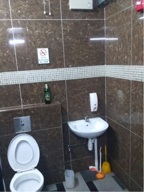 The public toilet that 'Rudi' had to use to shower, by just using a bucket and the sink (Photo: HOME)