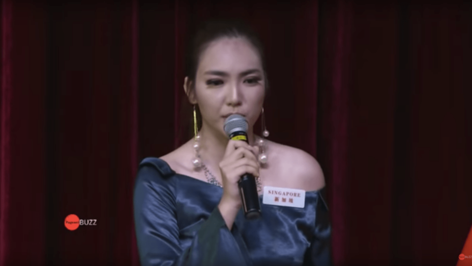 Miss Singapore World Vanessa Peh speaks at a head-to-head challenge against Miss Nepal at the Miss World 2018 qualifiers (Photo: Screenshot from PageantBuzz/YouTube)