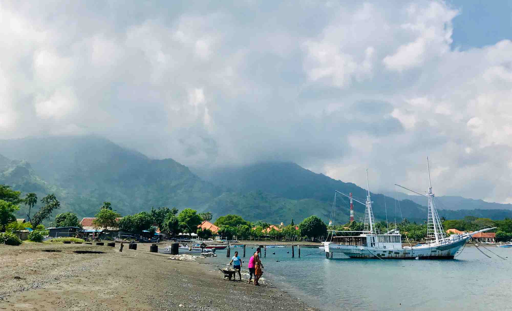 Locals clean up Pemuteran Beach. Photo: Coconuts Bali.