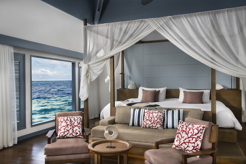 Overwater villa bedroom. Photo: Raffles Maldives Meradhoo