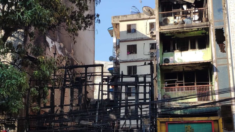 Remains of the burned-down building in Sanchaung Township. Photo: Nay Paing/Coconuts Yangon