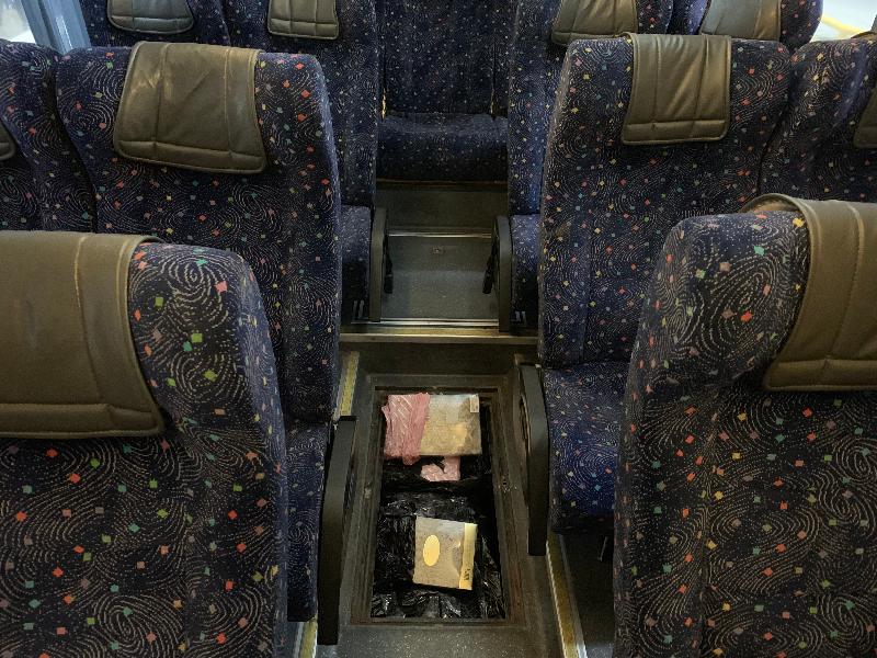 A cache of smuggled birds' nests hidden under the floor of a bus. Photo via GovHK.