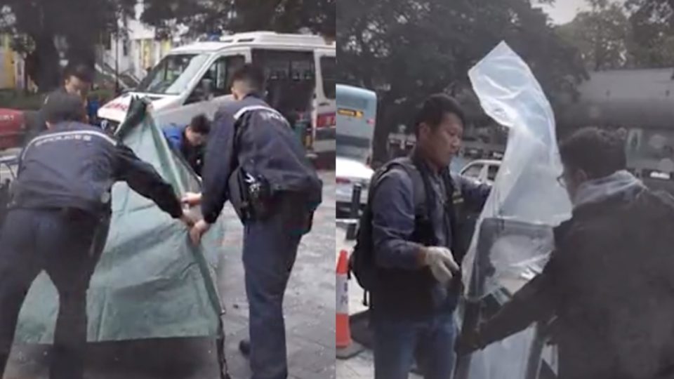 (Left) Police place a tent over the spot on Nathan Road where Zuo Shaofeng’s body fell after she was struck by a window that fell from the Mira Hong Kong hotel. (Right) Officers bag the metal window frame. Screengrab via Apple Daily video.