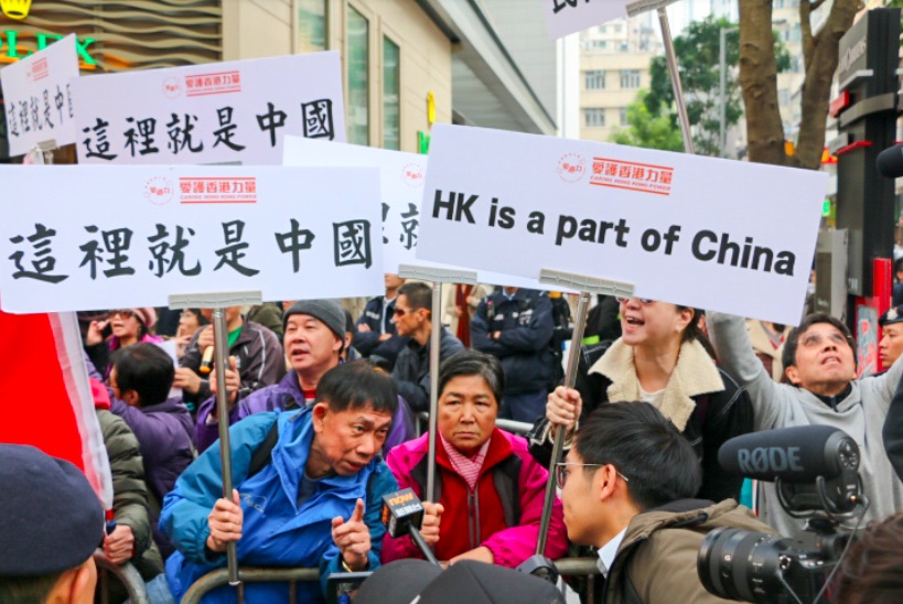 Pro-Beijing protestors along the annual January 1 rally. Photo by Coco Gao.