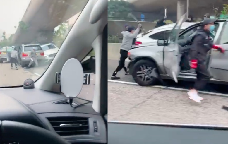 Video posted on social media shows a group of masked men armed with metal pipes and knives emerge from two cars and attack a car that had been rammed into the side of Prince Edward Road East. Screengrab via Facebook video.