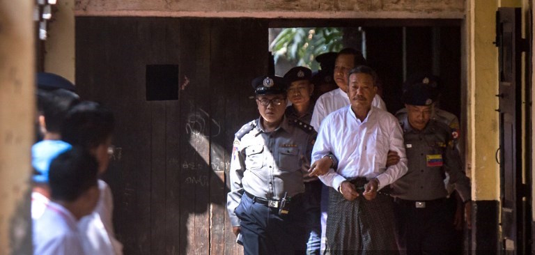 Kyi Lin, (2nd-R) the convicted gun man who shot and killed Ko Ni, a legal advisor to Aung San Suu Kyi’s National League for Democracy, followed by second suspect Aung Win Zaw are escorted by police on arrival to face the court verdict in Yangon on February 15, 2019. A Myanmar court on February 15, 2019, sentenced two people to death for the murder of a Muslim lawyer working to amend the nation’s controversial constitution, after a drawn-out trial backlit by allegations of impunity.
