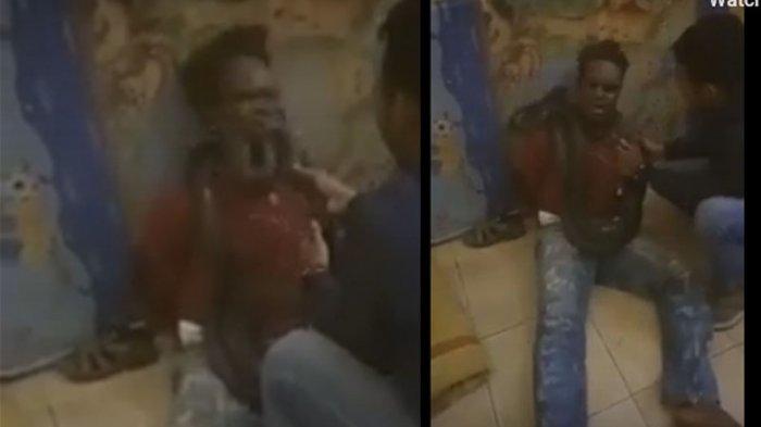 A live snake being used on an alleged phone thief during a police interrogation in the Indonesian province of Papua. Photo: Screengrabs by Tribun