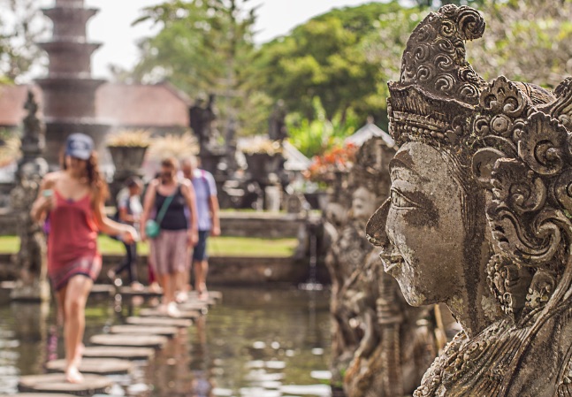Tourists visiting a water palace in Bali. Photo: Pixabay