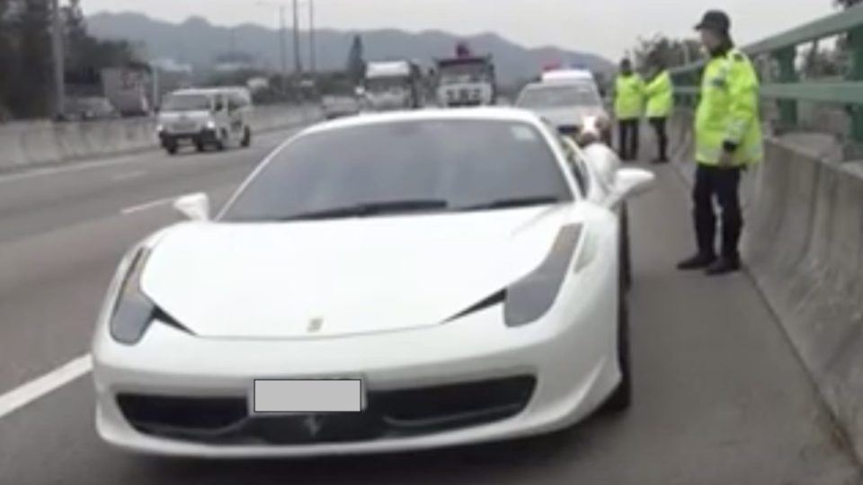 A Ferrari pulled over by police today for going more than twice the legal speed limit. Screengrab via YouTube.