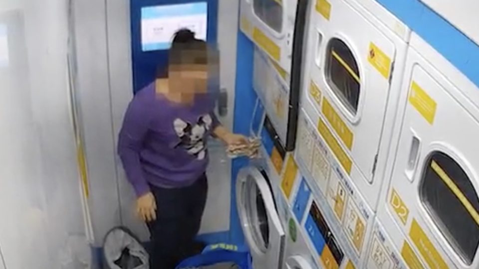 Police have arrested a woman who was caught on CCTV stealing up to US$9,000 from an unattended washing machine in a Hung Hom laundromat. Screengrab via Apple Daily video.