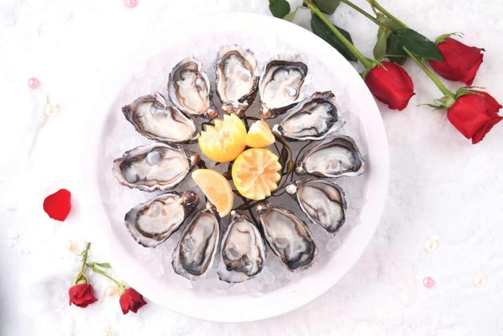 Freshly-shucked oysters at The Place. Photo via Cordis.