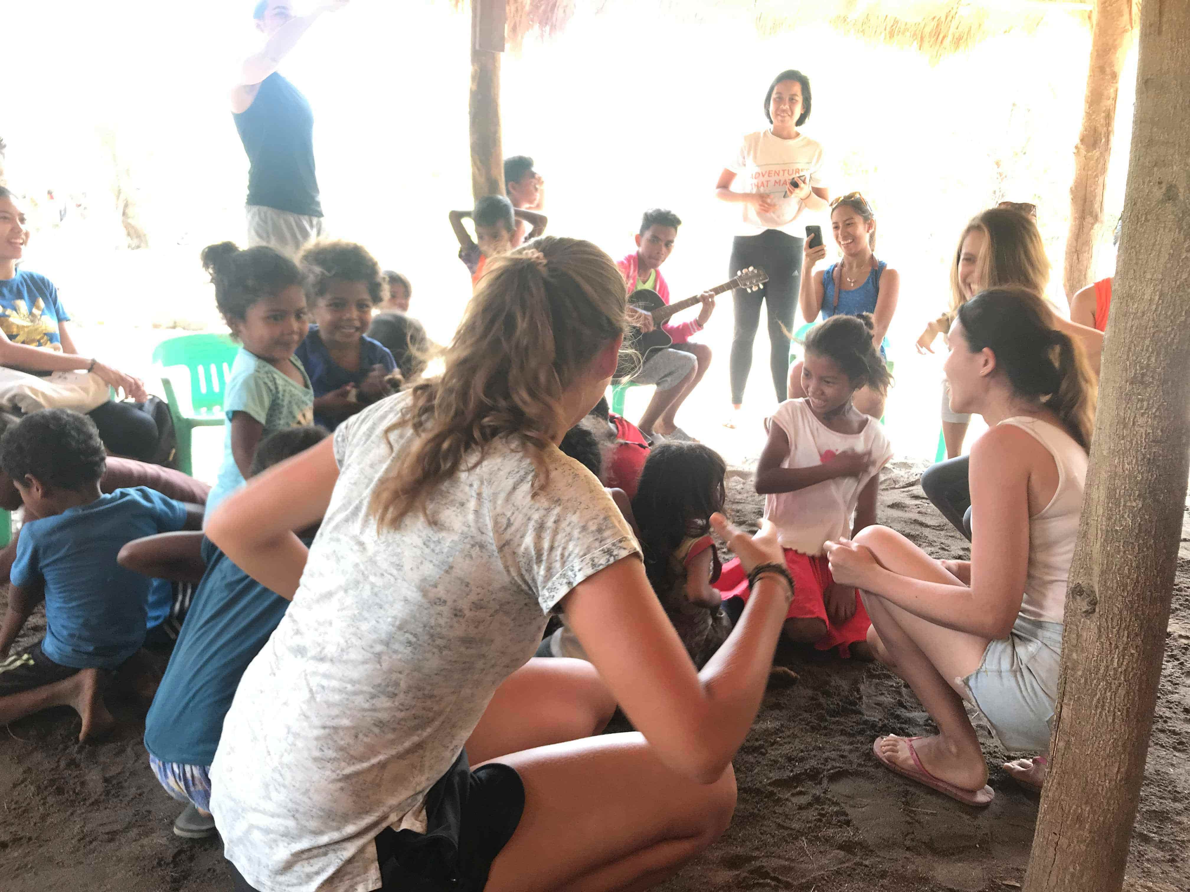 Guests playing with the Yangil kids. Photo: Jia Mercado